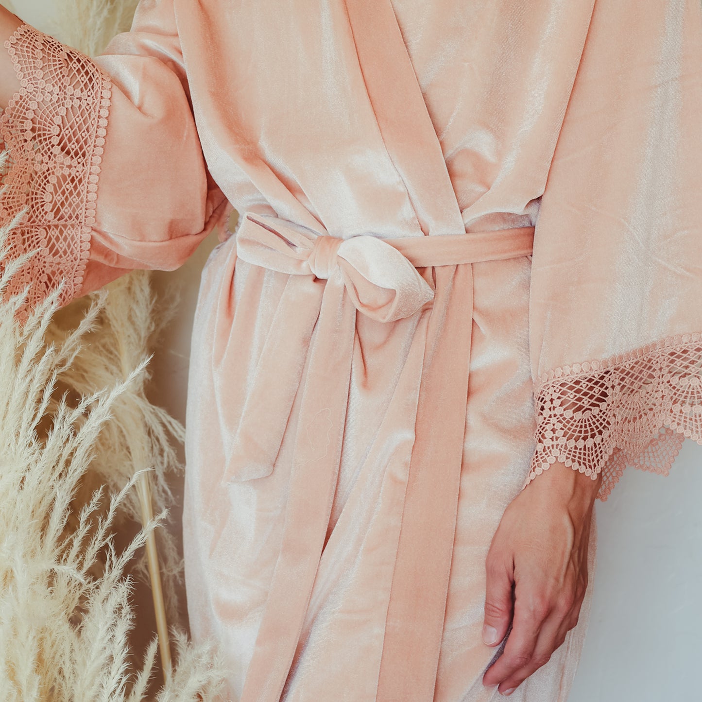 Blush pink velvet bridesmaids robe with delicate lace sleeve details, one size fits all