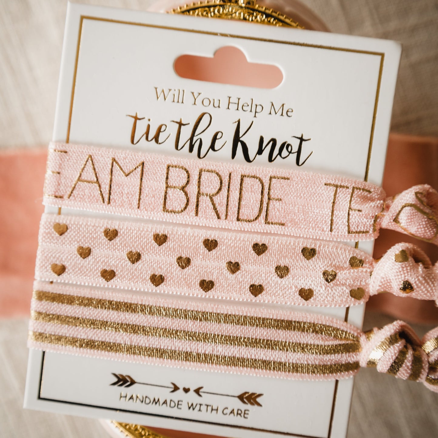 Gift your Bridesmaid with Something to Hold Their Hair Back as they Celebrate Team Bride