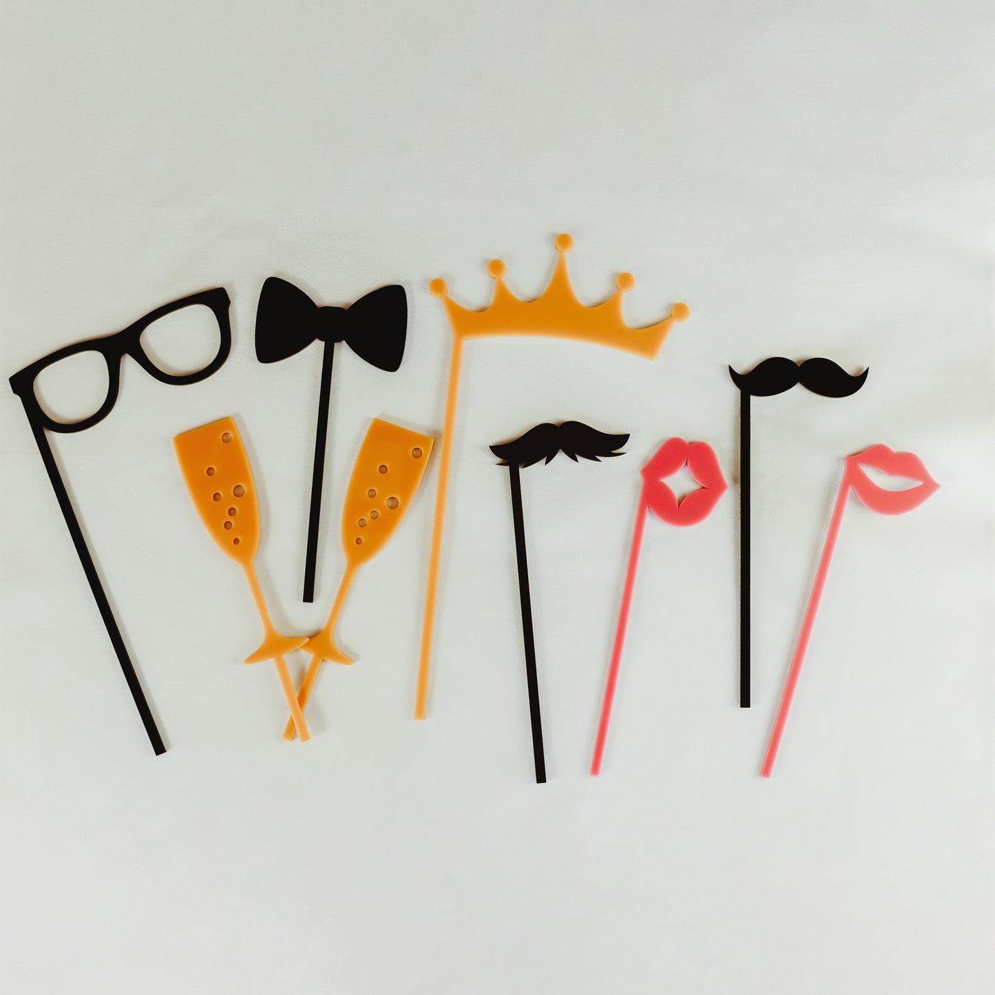 Keep the Photo Booth Party Going with High Quality Props on a Stick, from Lips to Mustaches, Crowns, Glasses, and More that are Made to Last