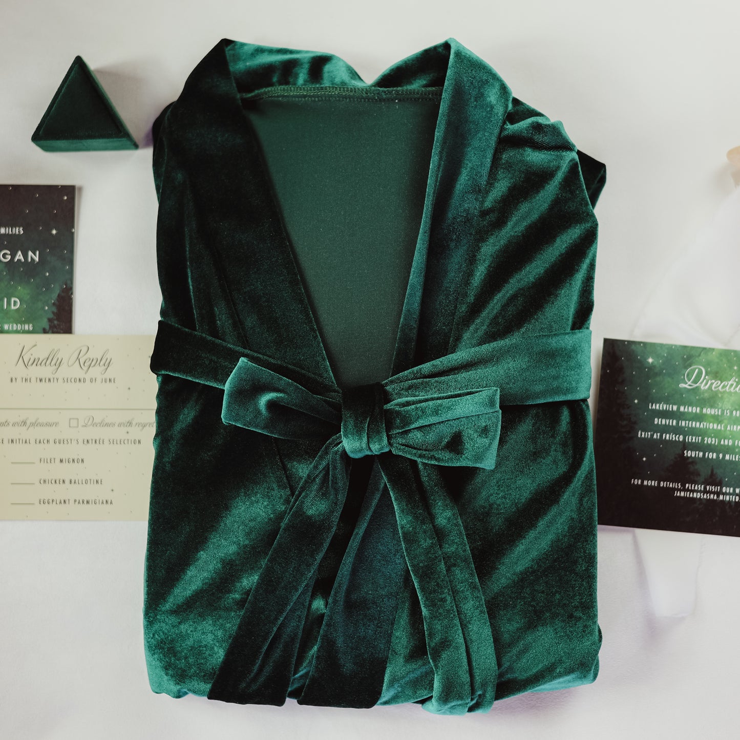 Sophisticated velvet robe with lace sleeve accents, perfect for bridesmaids to wear while getting ready