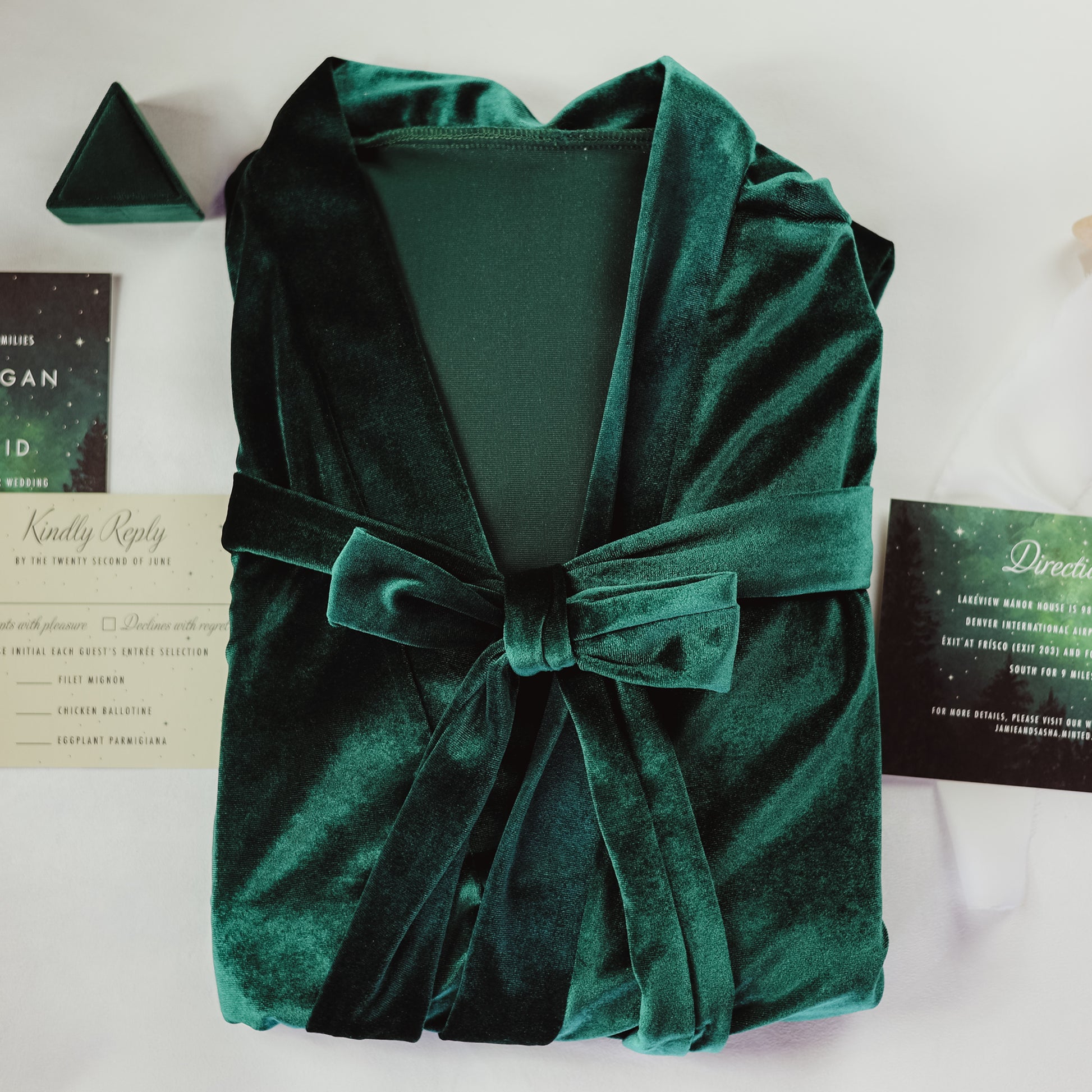 Sophisticated velvet robe with lace sleeve accents, perfect for bridesmaids to wear while getting ready