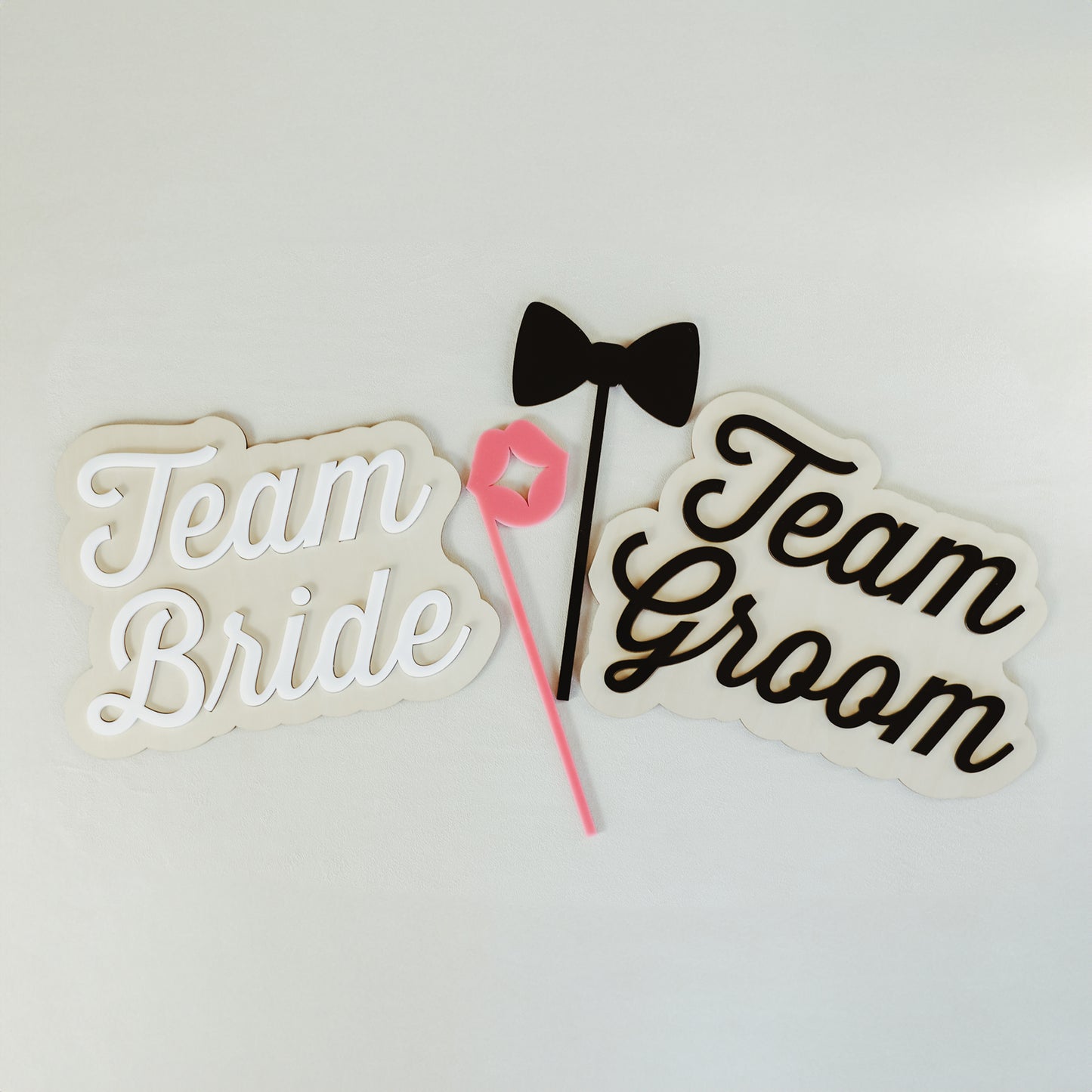 Get the Best Props for Your Photo Booth with Custom Signs from Ribbon & Rings With Any Hilarious or Heartfelt Message You Want