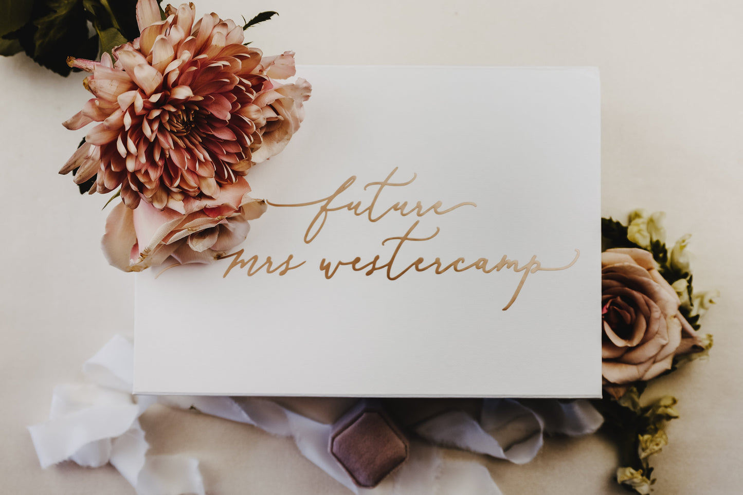 Show the Bride to Be Some Love with a Beautiful Gift Box Personalized with Her New Last Name in Calligraphy