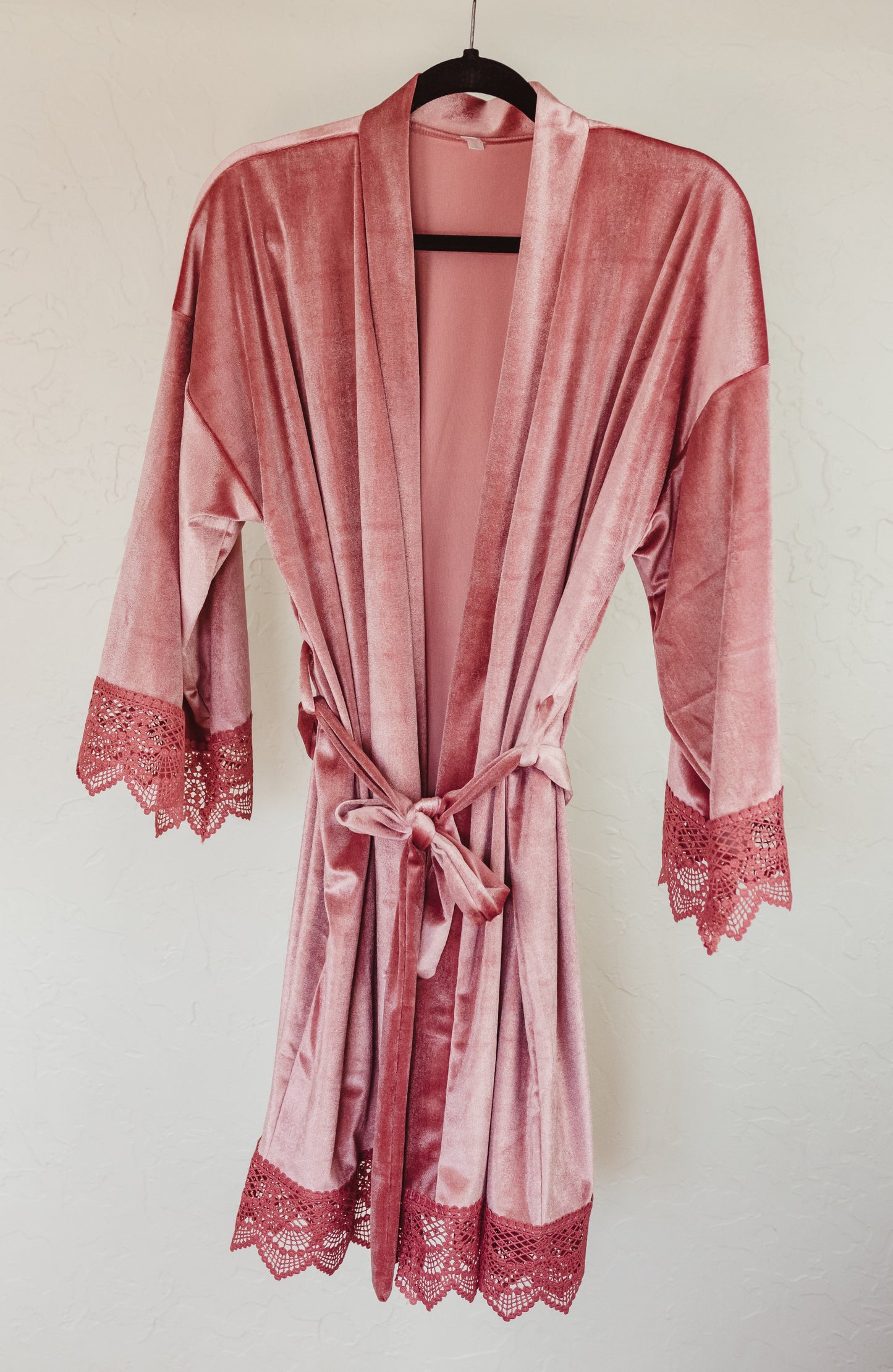 Luxurious velvet bridesmaid robe with delicate lace sleeve detail, designed for ultimate pampering.