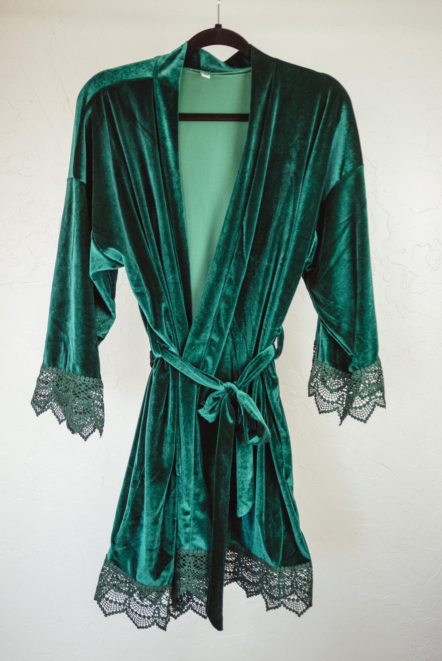 This plush velvet robe with lace detailing offers bridesmaids a moment of luxury and relaxation